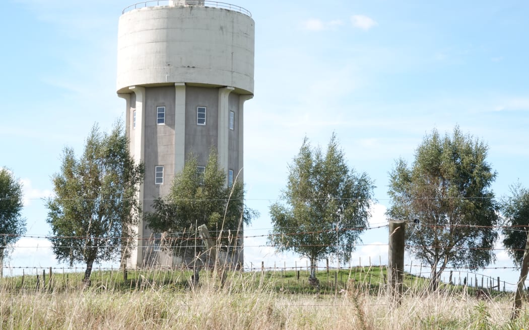 The 23-metre-tall water tower is visible from the nearby state highway.