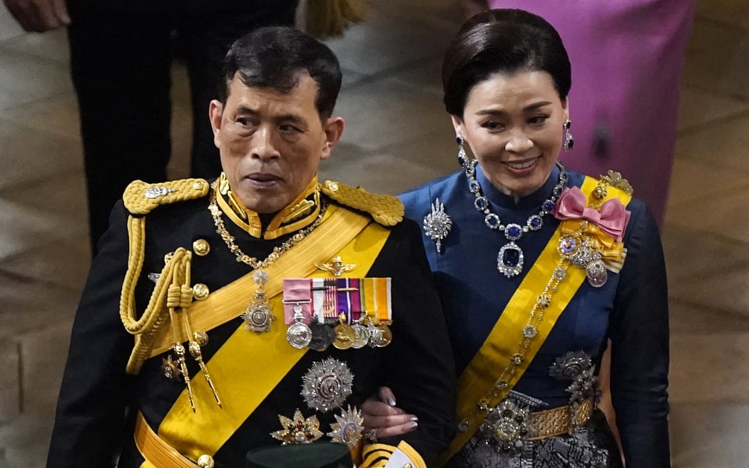 King Vajiralongkorn and Queen Suthida of Thailand arrive at Westminster Abbey on May 6, 2023, for the coronation of King Charles III (Photo by Andrew Matthews / POOL / AFP)