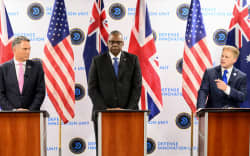 (From left) Australian Deputy Prime Minister and Defense Minister Richard Marles, US Defense Secretary Lloyd Austin and British Defense Secretary Grant Shapps hold a press conference during the AUKUS Defense Ministerial Meeting in Mountain View, California, on December 1, 2023.