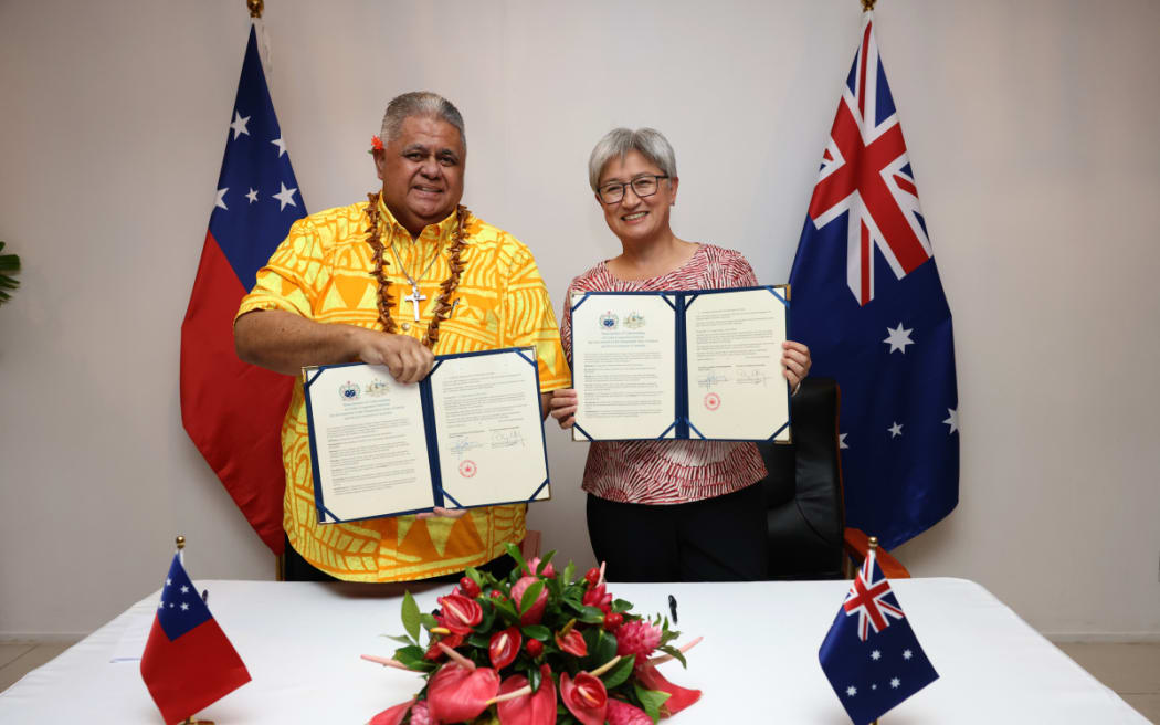 Foreign Minister the Hon Senator Penny Wong Penny Wong during the signing of Policing, and Cyber MOUS with with Samoan Prime Minister The Honourable Susuga La?aulialemalietoa Leuatea Polataivao Fosi Schmidt at Taumeasina Resort, Samoa on Tuesday 24 February 2026.