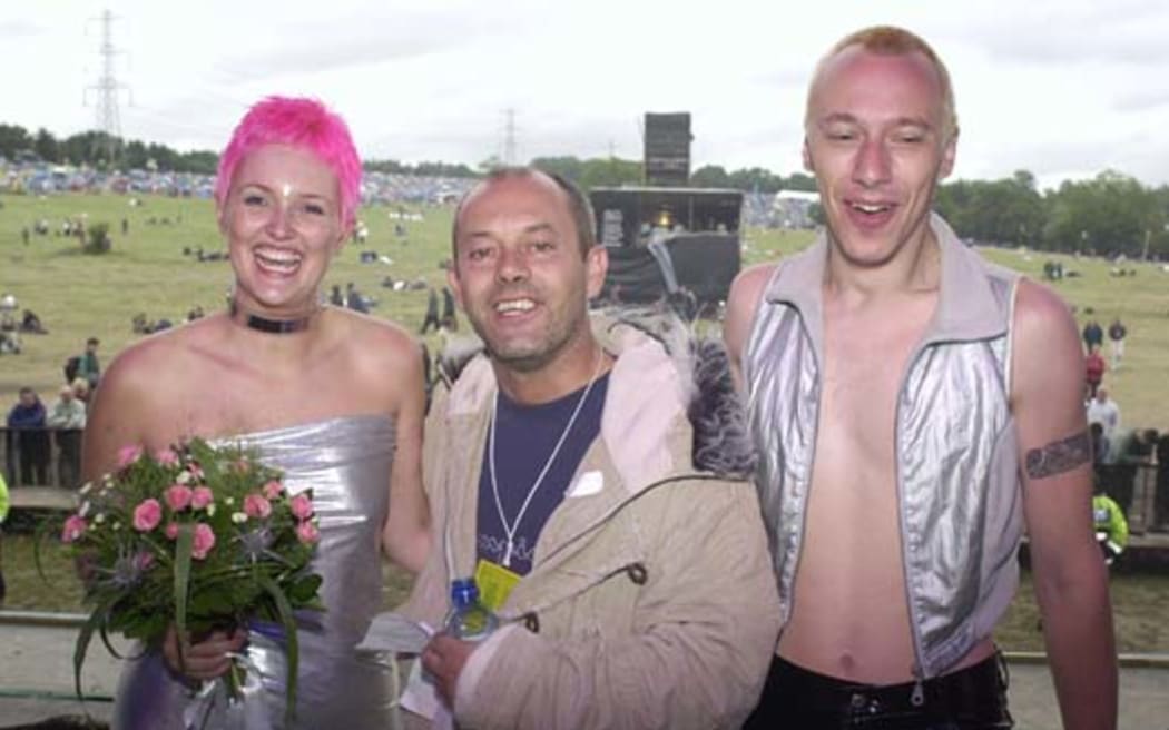 Helen and Chelfyn Baxter's "pagan handfasting" wedding ceremony was on stage at the Glastonbury Music Festival in 2000. Keith Allen (centre) was "high priest".
