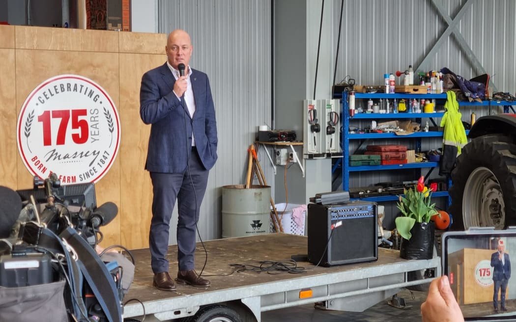 National Party leader Christopher Luxon addresses supporters at  Field Torque, a rural machine store in Stratford.