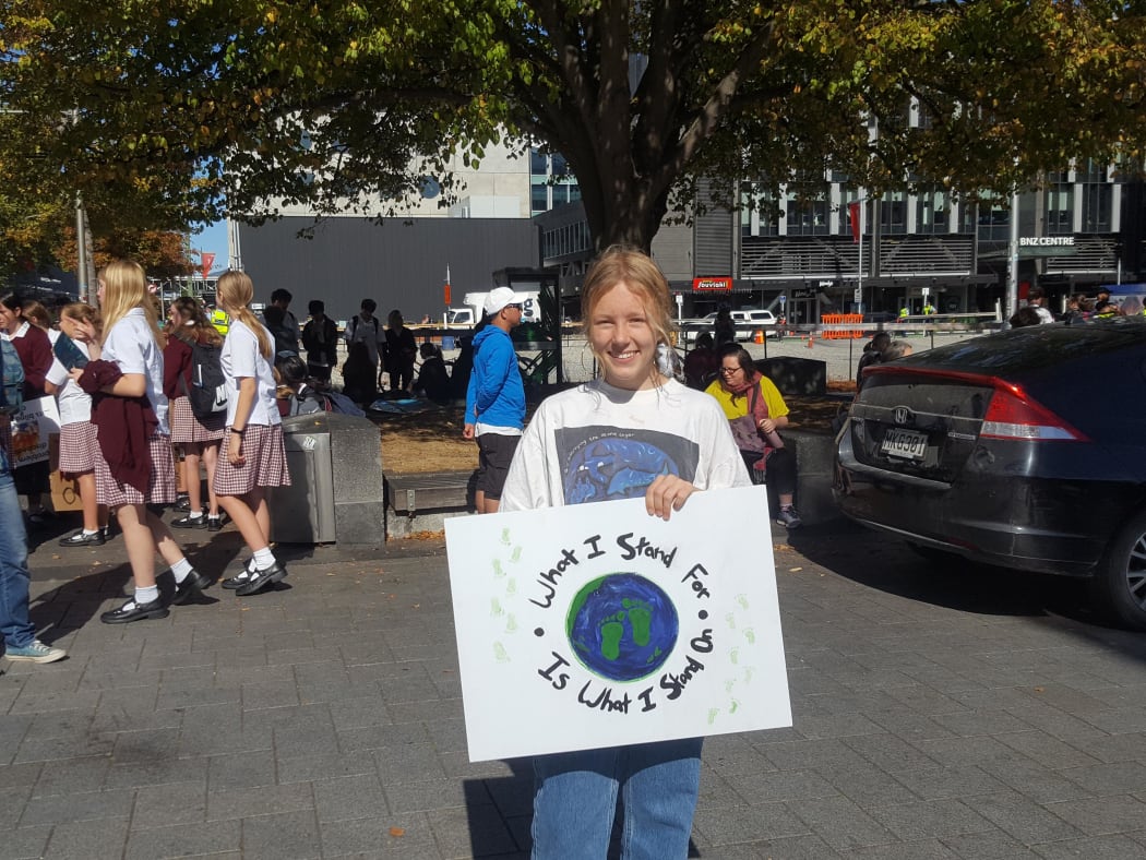 Anna Babington, 14, is out protesting in Christchurch to protect her future grandchildren.