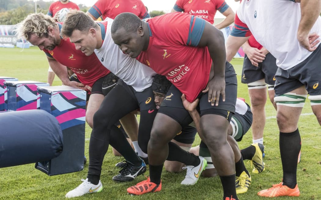 Springboks Frans Malherbe, Adriaan Strauss and Tendai Mtawarira train before facing the All Blacks in the RWC semi final.