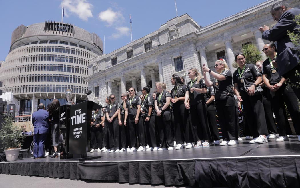 The Black Ferns squad and crowds gathered outside Parliament to celebrate the team's World Cup win, on 13 December, 2022.