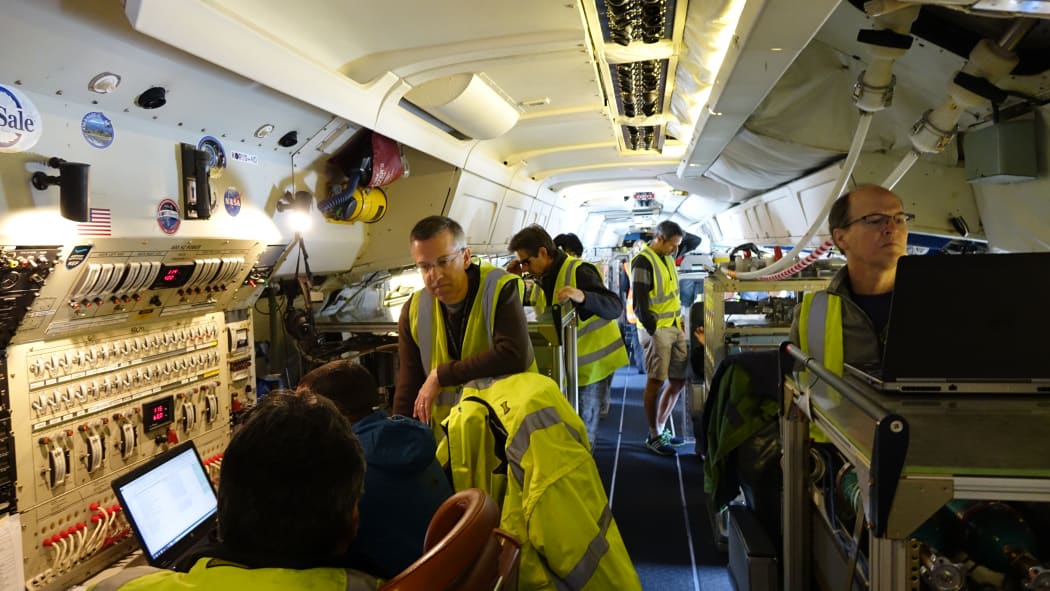 Inside NASA's DC-8 aircraft, which is conducting a worldwide survey of the earth's atmosphere.