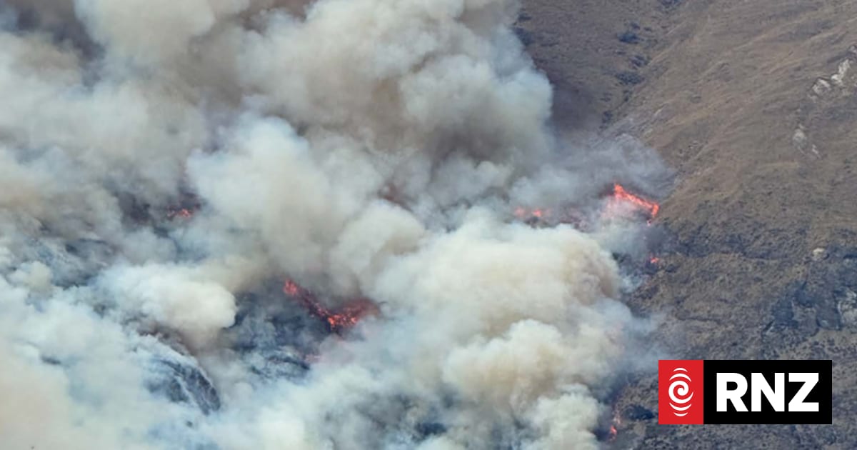 FENZ responding to vegetation fire on Walter Peak, smoke visible from Queenstown