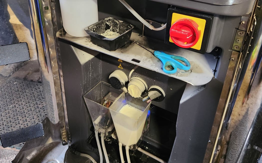 The calves' feed is mixed and piped automatically to feeding stalls