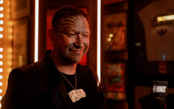 Rob Ruha, winner of the 2022 APRA Silver Scroll Award, along with Kaea Hills, Te Amorutu Broughton, Ainsley Tai, Dan Martin, Whenua Patuwai for their track '35'.