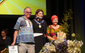 Hans van Kregten (left) and Meredith Stewart with Gisborne Mayor Rehette Stoltz accepting on behalf of the Tairāwhiti Multicultural Council.