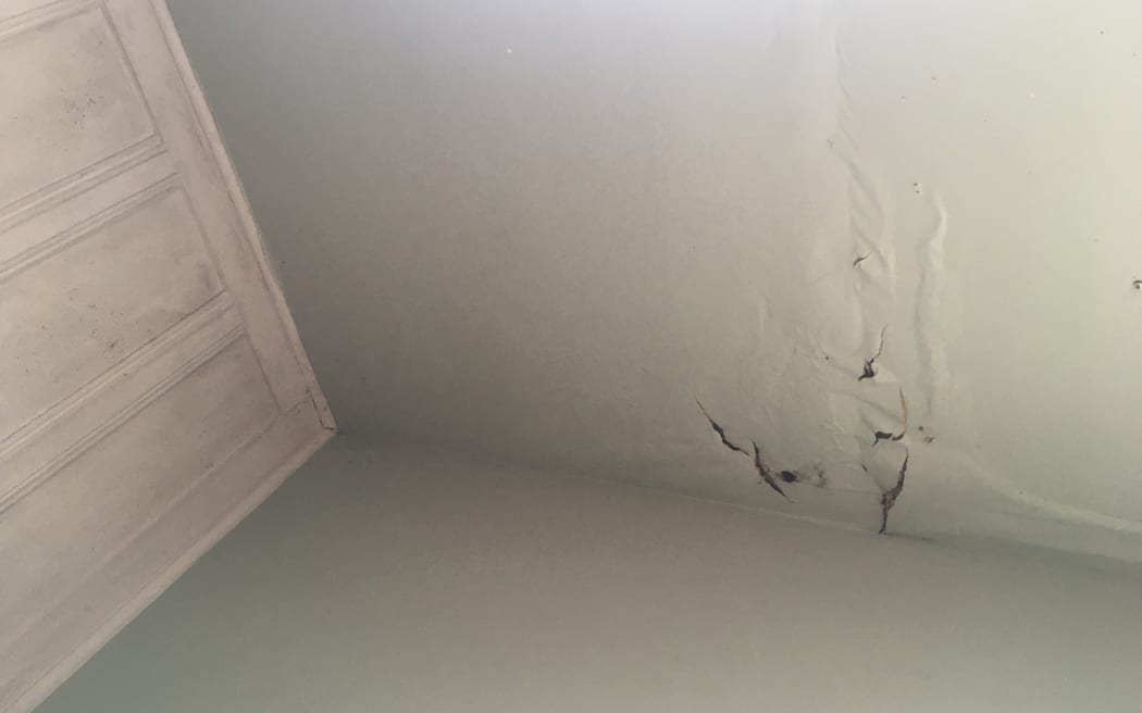Cracks on the ceiling of a rental.