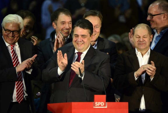 SPD leader Sigmar Gabriel, centre, and party members.