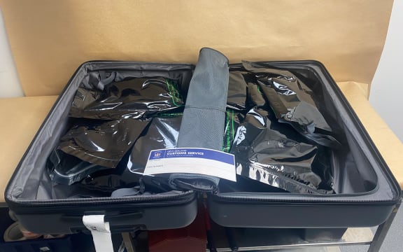 The contents of the suitcase containing $4.67 million worth of methamphetamine and cocaine in vacuum sealed bags.