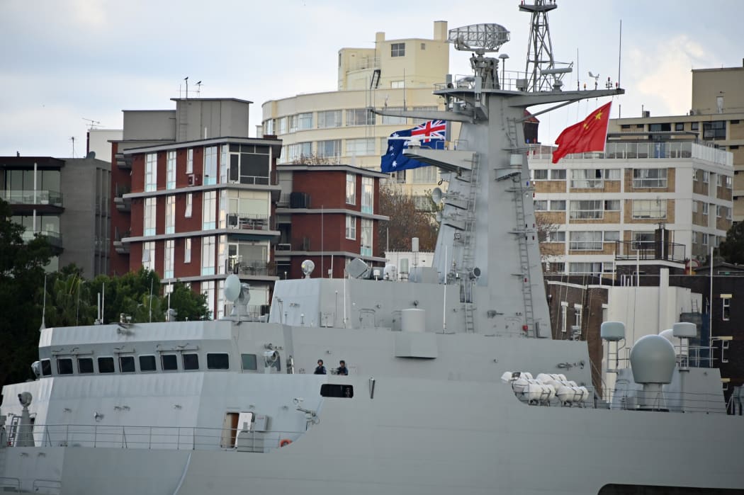 Chinese warships are seen docked at Garden Island naval base in Sydney on June 3, 2019. - Australians were surprised by the sight of three Chinese warships steaming into to Sydney Harbour, on June 3, 2019 forcing the prime minister to reassure jittery residents. (Photo by PETER PARKS / AFP)