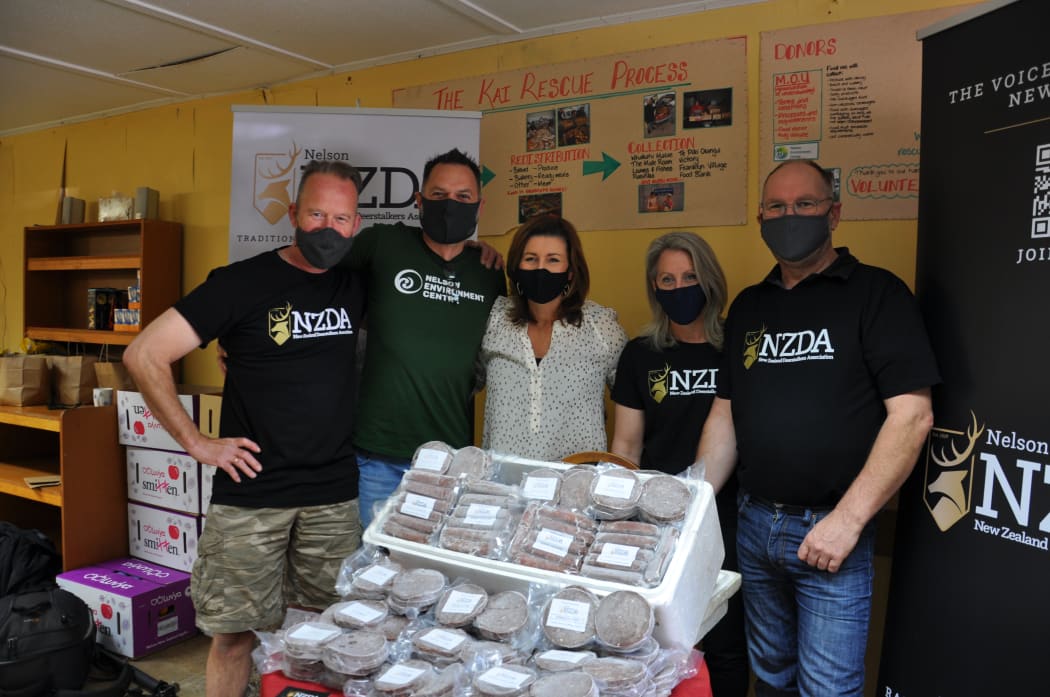 Members of the Nelson branch of the New Zealand Deerstalkers Association with Nelson Environment Centre CEO Anton Drazevic and Nelson Mayor Rachel Reese.