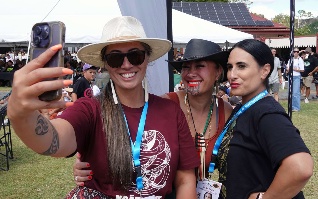 Hūhana Lyndon, Skye Kimura and Sara Reihana-Tara grab a photographic memento.