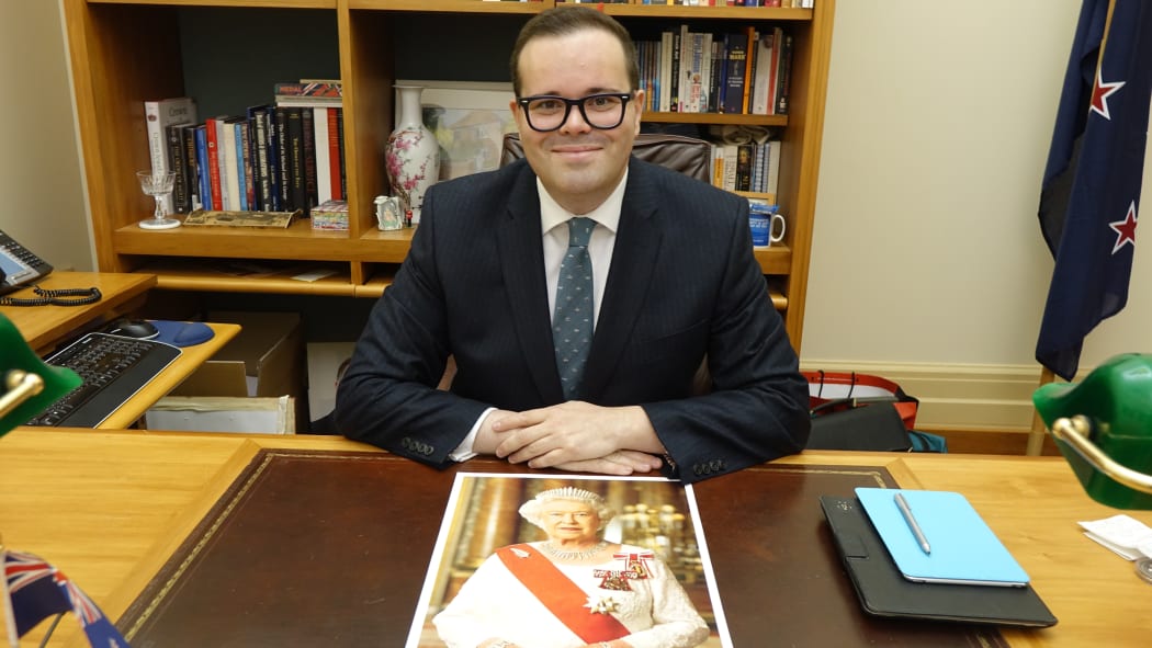 National MP and royalist Paul Foster-Bell poses with the Queen.