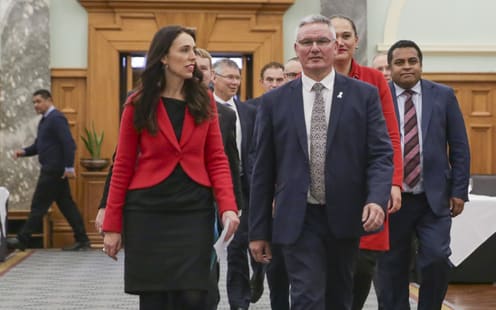 Jacinda Ardern and Kelvin Davis walking to media conference at Parliament after Little stands down.