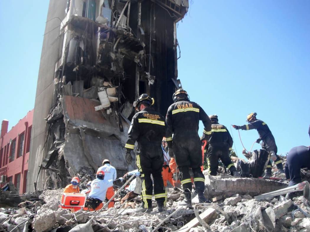 Rescue services at work on the Canterbury Television (CTV) building.