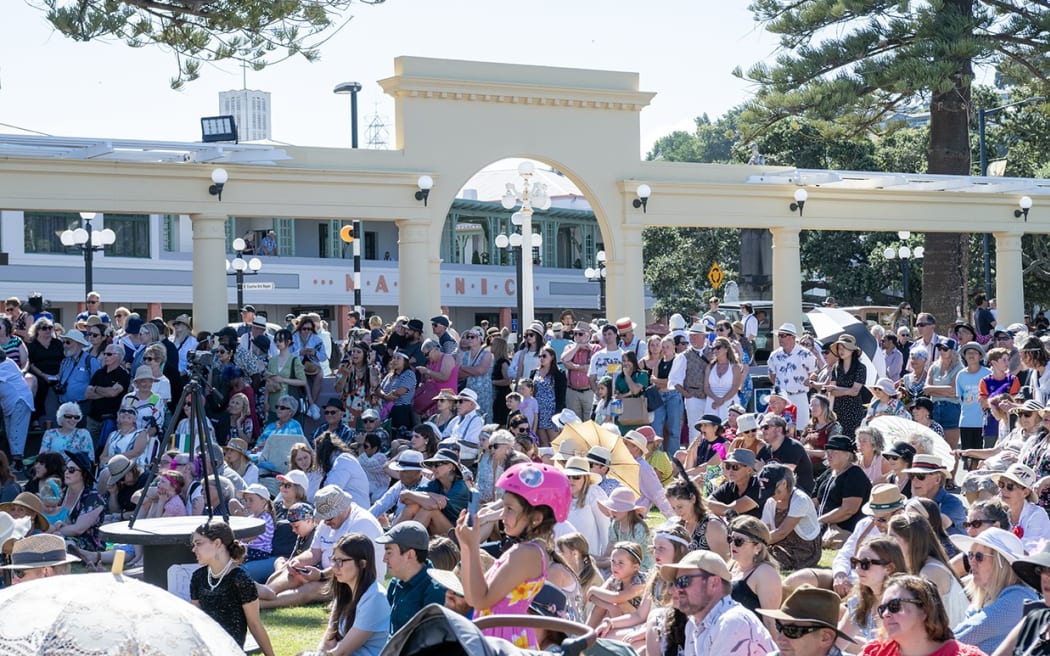 Crowds watching the shows at the Sound Shell for the Napier Art Deco Festival. Photo / Connull Lang
HBG 17Feb25 -
HBG 17Feb25 - Main image: The flyovers delighted all weekend at Napier's Art Deco Festival.Napier's Phoenix Wairau, 5, and Heaven Whare dressed to impress.Napier classic vehicle enthusiast Chris Clarke gives a wave.Rafe the dog well prepared for his ride in a 1936 Austin.