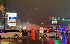 This handout picture courtesy of the Philadelphia Office of Emergency Management shows a plume of smoke and emergency responders after a small aircraft crashed in a neighborhood in Northeast Philadephia, Pennsylvania on January 31, 2025. A small aircraft crashed and sparked a large fire in a built-up neighborhood of Philadelphia on January 31, 2025, prompting a major emergency response, local media reported. A fireball was followed by the ignition of several fires on the ground in a northeastern neighborhood of the east coast US city, the local FOX29 channel showed. (Photo by Philadelphia Office of Emergency Management / AFP) / RESTRICTED TO EDITORIAL USE - MANDATORY CREDIT "AFP PHOTO / PHILADELPHIA OFFICE OF EMERGENCY MANAGEMENT" - NO MARKETING NO ADVERTISING CAMPAIGNS - DISTRIBUTED AS A SERVICE TO CLIENTS