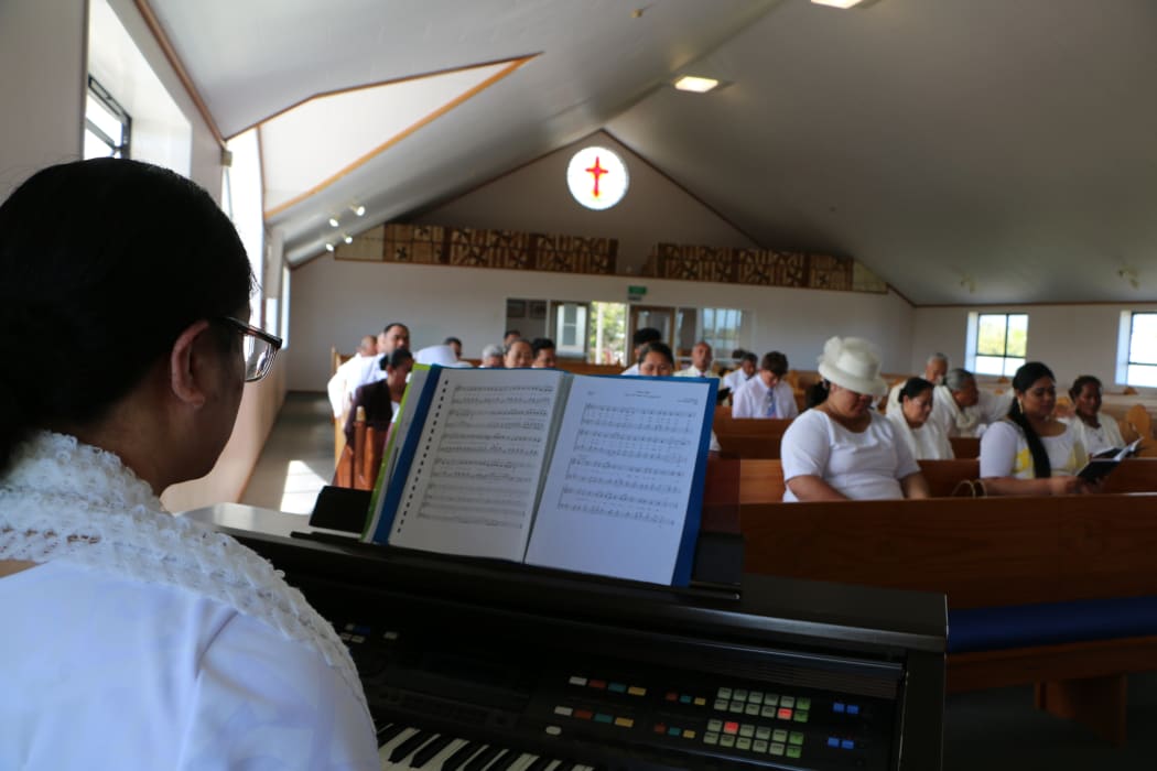 A pianist plays the Samoan hymn "Iesu, foa'i mai o lou Agaga Sa" with the Samoan Methodist congregation in Levin.