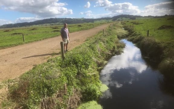 Geoff Crawford and part of a fenced-off stream.