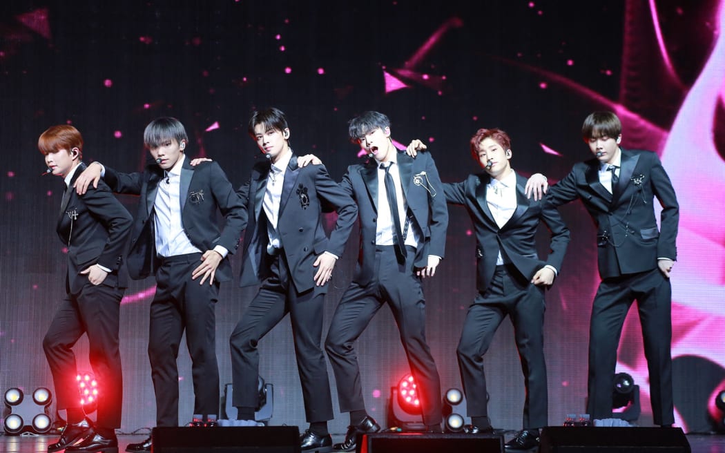 Members of South Korean boy band Astro perform during a press conference for their mini album "Dream Part.02" in Seoul, South Korea, 1 November 2017. (Photo by More forms / Imaginechina / Imaginechina via AFP)