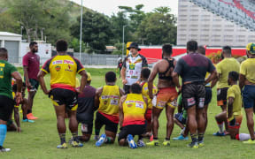 PNG Hunters coach Matt Church briefs training squad.