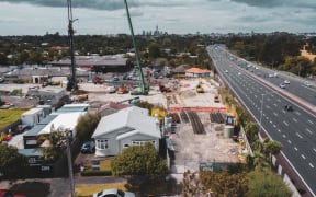 Last house standing - the owner of this 1920s bungalow in Parr Rd North, Point Chevalier has held out as long as he could against the construction of Foodstuffs’ New World supermarket on land all around his house. But now he’s selling.