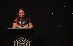 Salina Fisher, the youngest ever winner of the SOUNZ Contemporary Award collects her prize at the APRA Silver Scroll Awards 2016