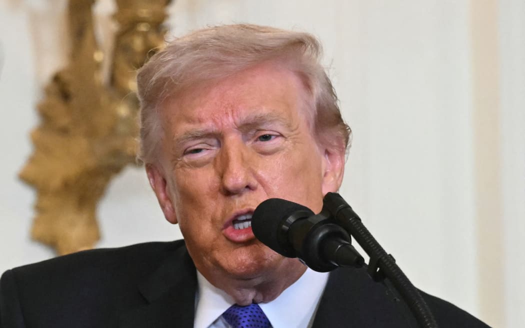US President Donald Trump speaks during a Medal of Honor ceremony in the East Room of the White House on March 2, 2026, in Washington, DC. President Trump awarded the Medal of Honor to retired Army Command Sgt. Major Terry P. Richardson, who served in the Vietnam War, posthumously to Army Master Sgt. Roderick W. Edmonds, who served in World War II, and posthumously to Staff Sgt. Michael Ollis, who died in combat in Afghanistan in 2013. (Photo by SAUL LOEB / AFP)