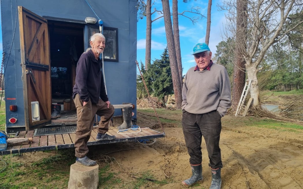 Jim Papps and his neighbour Paul Harper on their property next to the Dove River, in Dovedale.
