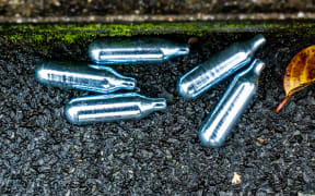 Cartridge of nitrous oxide, also called laughing gas or nangs, can cause serious health problems. These were found in a street in France in 2020.