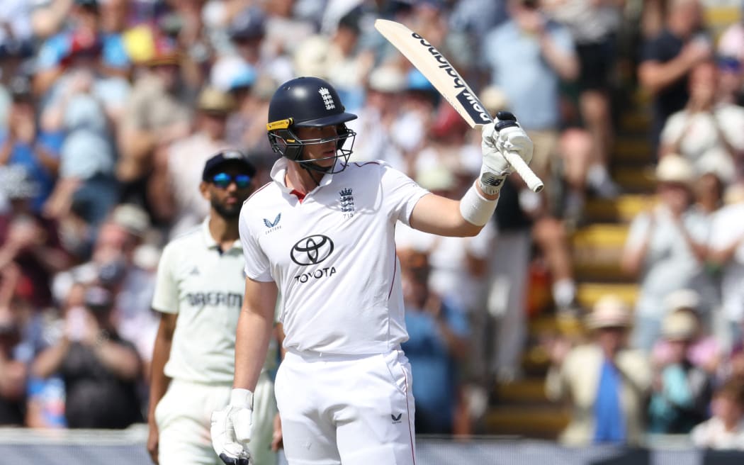 England's Jamie Smith reacts to reaching 150 on day three of the second cricket test match between England and India at Edgbaston cricket ground in Birmingham, central England on July 4, 2025. (Photo by Darren Staples / AFP) / RESTRICTED TO EDITORIAL USE. NO ASSOCIATION WITH DIRECT COMPETITOR OF SPONSOR, PARTNER, OR SUPPLIER OF THE ECB