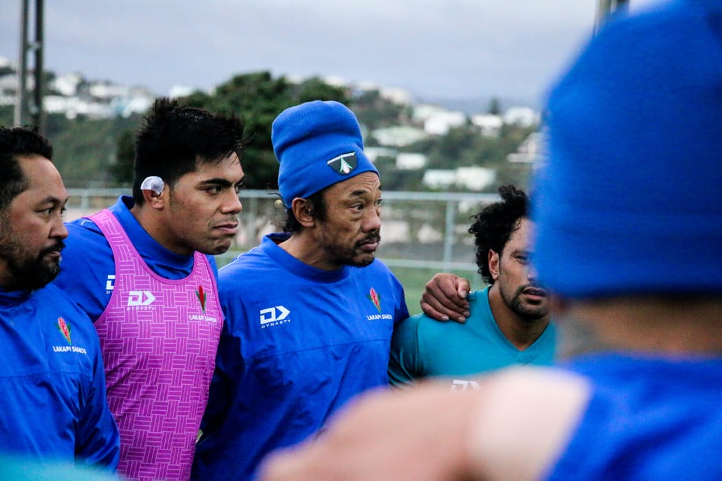 Manu Samoa coach Seilala Mapusua, captain Michael Alaalatoa and assistant coach Tana Umaga listen in during training.