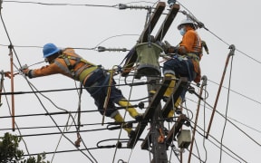 Vector crews out in storm damage repairs - Vector Limited, Auckland, New Zealand.   13  February  2022