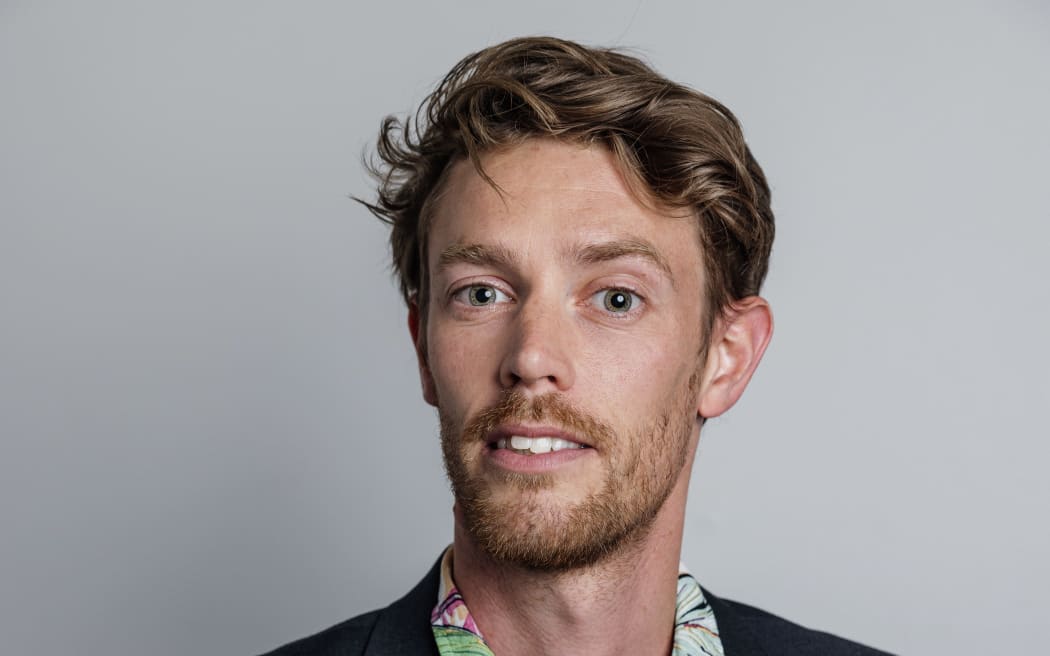 A headshot of comedian Tim Batt.