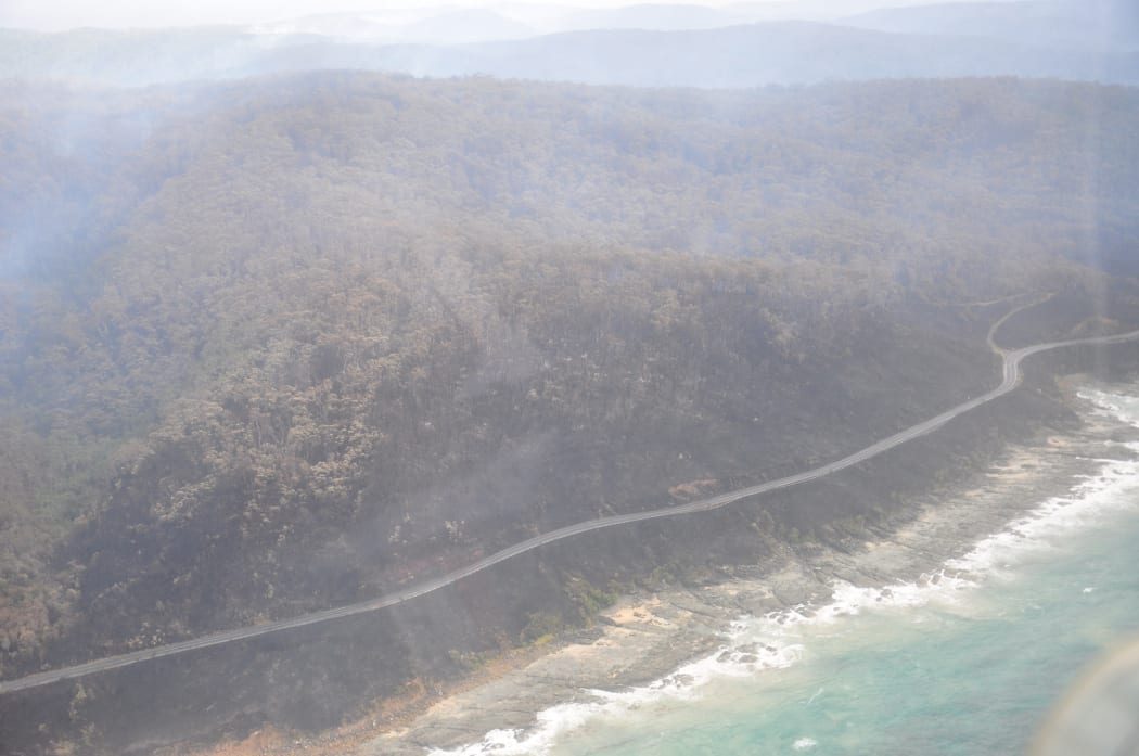 A supplied image obtained Sunday, Dec. 27, 2015 of burnt out trees near the Great Ocean Rd at Separation Creek in Victoria.