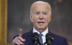 President Joe Biden delivers remarks on the verdict in former President Donald Trump's hush money trial and on the Middle East, from the State Dining Room of the White House, Friday, May 31, 2024, in Washington. (AP Photo/Evan Vucci)