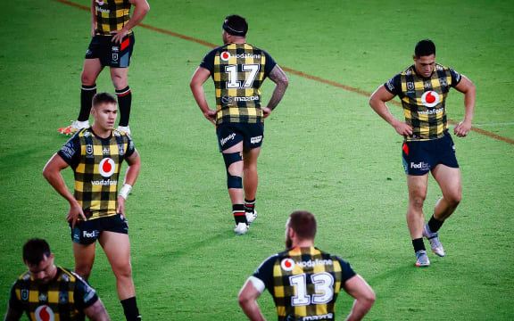 Dejected Warriors players.