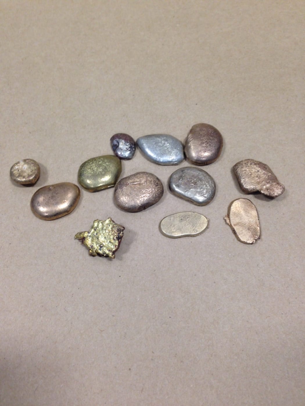 The police said dawn raids in Whangarei turned up $6500 worth of gold that had been melted down.