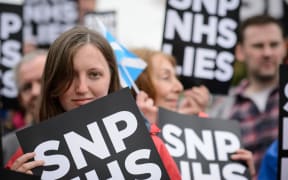 "Better Together" campaigners rally in Glasgow on Tuesday.