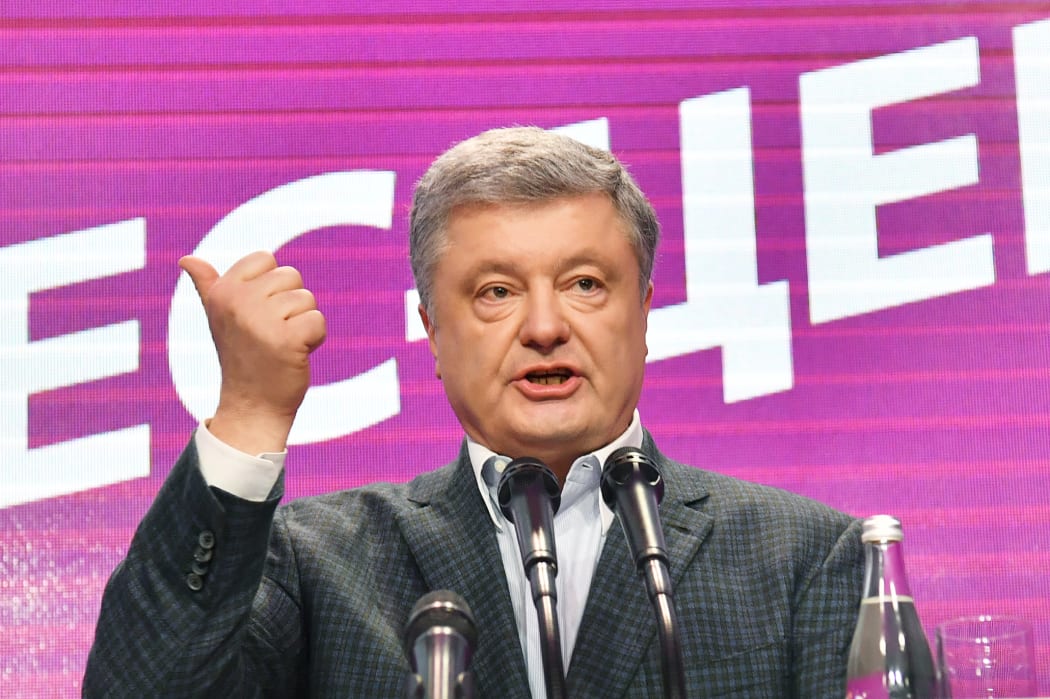 Ukrainian incumbent president Petro Poroshenko delivers a speech at his campaign headquarters in Kiev.
