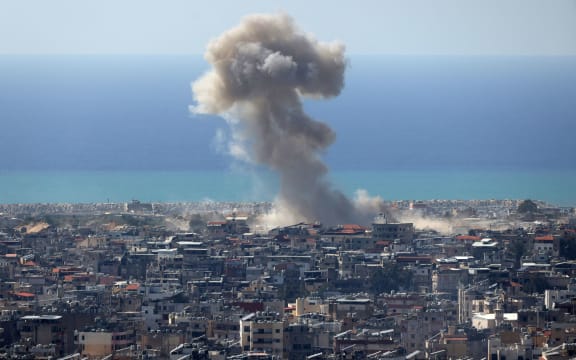 Smoke rises from the site of an Israeli air strike that targeted an area in the southern suburbs of the Lebanese capital Beirut on March 17, 2026. Israel launched a wave of strikes on Tehran and Beirut while attacks in Baghdad drew neighbouring Iraq deeper into the Middle East war that has sparked economic turmoil across the globe. The war, now in its third week, has killed hundreds and quickly spread to include Iranian strikes on Gulf nations as well Israeli bombardment of Lebanon.