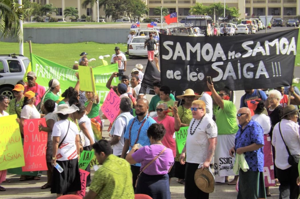 Around 100 people protested outside Samoa's parliament