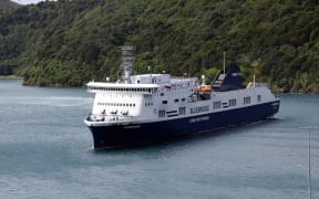 Bluebridge ferry the Connemara berthing at Picton wharf, helped by a tug, after earlier hitting the wharf while attempting to berth.