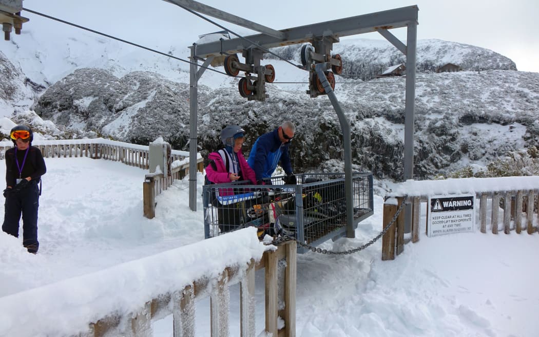The flying fox delivers skiers' equipment to the lodge.