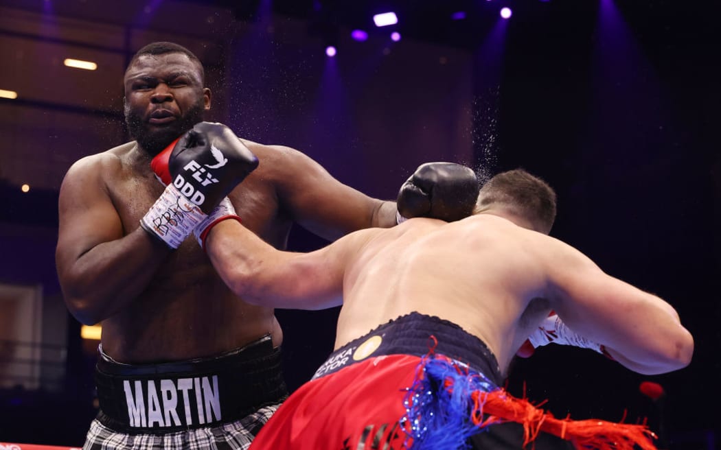 Joseph Parker punches Martin Bakole during the WBO Interim World Heavyweight title fight.