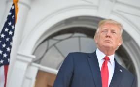 US President Donald Trump speaks to reporters about North Korea outside his Bedminster National Golf Club in New Jersey.